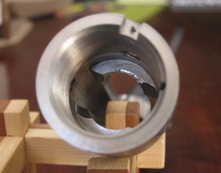 Savage rifle action lug gouged?